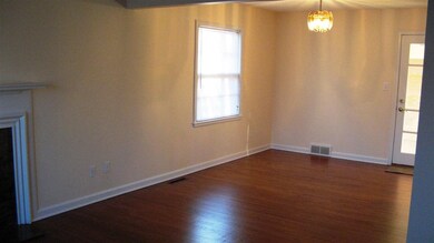 Beautifully refinished wood floors.