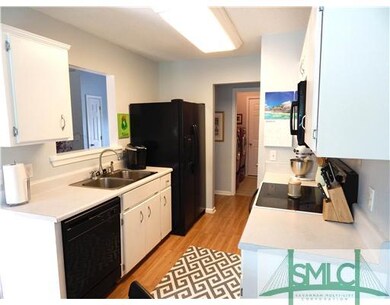 Kitchen. Galley kitchen includes all appliances