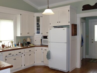 Kitchen and the little entry the door to the left 