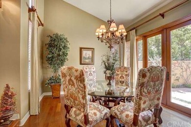 Elegant dining room with French doors that lead to