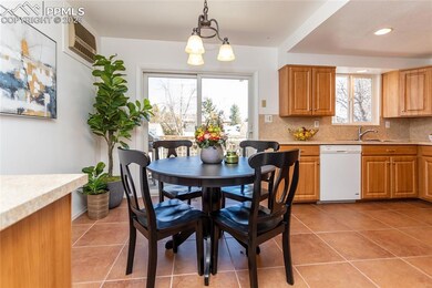 Dining room with tile flooring.