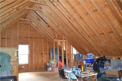 OVER 990 SF OF EXPANDABLE SPACE OVER DETACHED GARAGE - READY TO FINISH OUT!