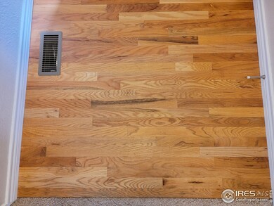Hardwood floors in the entryway.