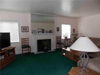 Living Room. Beautiful fireplace that has not been