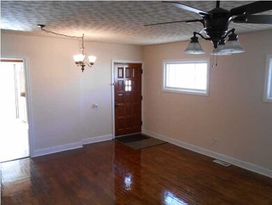 This is a welcoming entryway to a beautifully upda