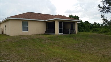 715 Azure Ave, Lehigh Acres, FL 33974 - photo 2