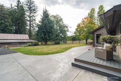 View from front patio towards yard & barn.