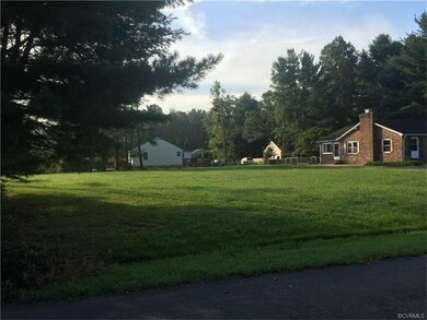 Street View of Large Rolling 1 Acre Lot...more in 