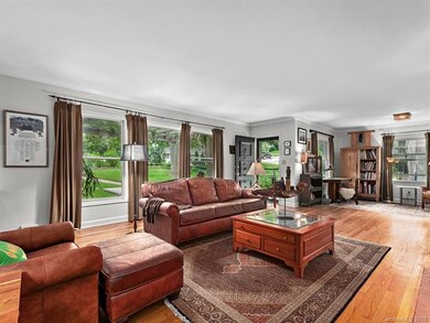 Open living area with large windows.