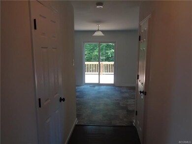 Foyer with hardwood flooring