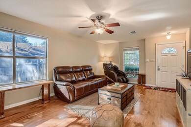 Living room with light wood finished floors and a