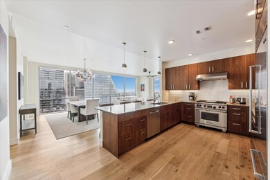 Kitchen featuring visible vents, appliances with 