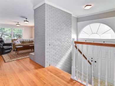The entrance... a beautiful painted brick fireplac