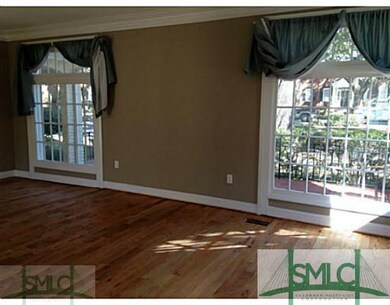Den/Family/Great Room. Large Bay Windows Allow For