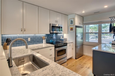 21 Stirling Cove unit E, Greenport, NY 11944 - photo 2