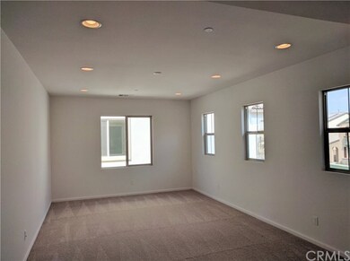 Higher 9' ceilings, numerous windows, and upgraded