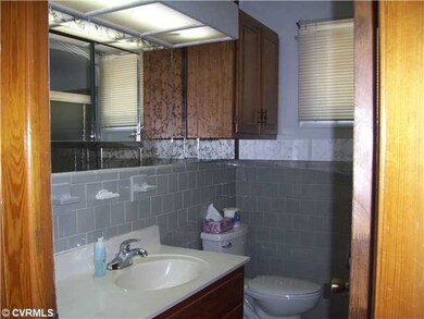 Other - Hall bath with tiled shower that has seat 