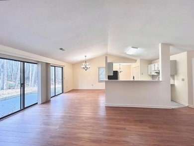 Unfurnished living room with plenty of natural lig