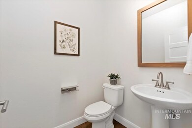 Bathroom featuring toilet and baseboards