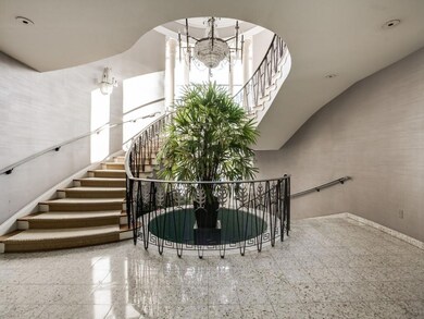 Foyer of entrance. Stairs on right lead to courtya