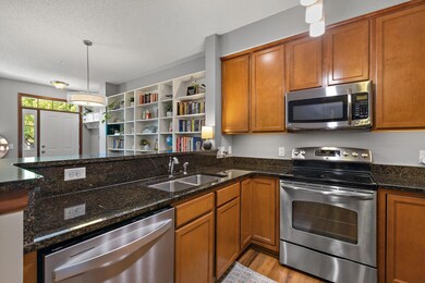 The main floor kitchen has plenty of cabinet storage space with an open concept design.