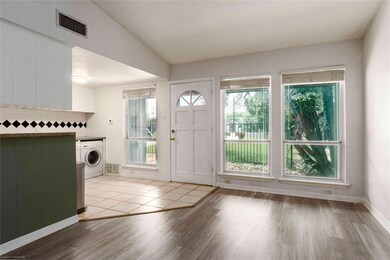 Entrance foyer with washer / clothes dryer, wood 