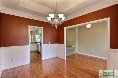 Formal Dining Room ~ Trey Ceiling ~ Wood Flooring 