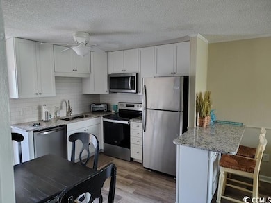 Check out the fabulous cabinets and granite too!