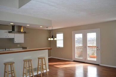 KITCHEN COUNTER AND DINING AREA.  What a great ope