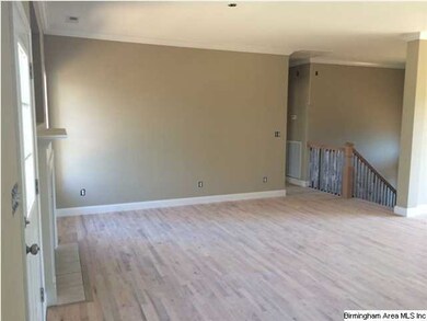 Great room with wood floors.