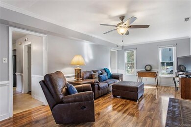Spacious family room with hardwood floors, ceiling