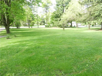 Exterior Front. The home sits back from the main r