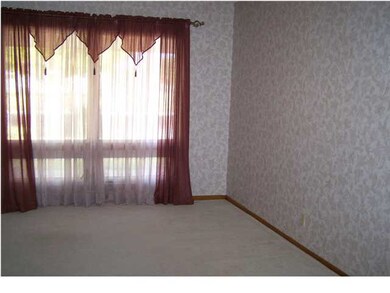 Main living room has a really nice picture window.