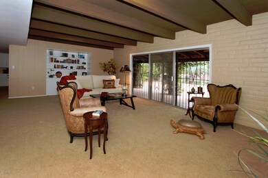 Family Rm w/Fireplace & Beamed Ceiling 3