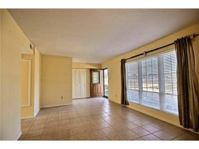 Big great room. Downstairs is tiled! New windows t