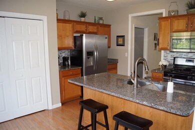 The kitchen with extra large pantry and new granit