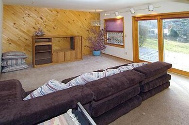Family room with access to back deck & l