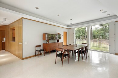 Dining area in great room. Radiant heated terrazzo