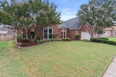 View of front of property featuring a front yard a