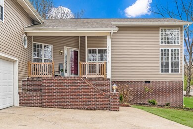 You'll love watching sunrises from your front porch and the sunset from your screened in porch or deck in the back!
