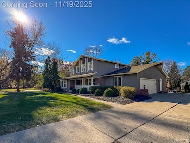 Double wide concrete driveway and side entry attached garage