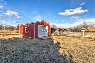 Red Outbuilding and Metal Shed