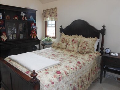 Sunny, cheerful master suite on main level