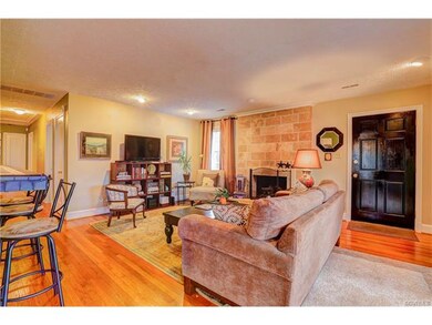 Gas fireplace and beautiful refinished floors thro