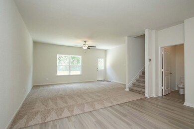 The huge living room offers plenty of space for your sectional sofa, media cabinet, coffee tables and more!