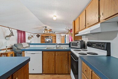 Kitchen with range with electric stovetop, white 