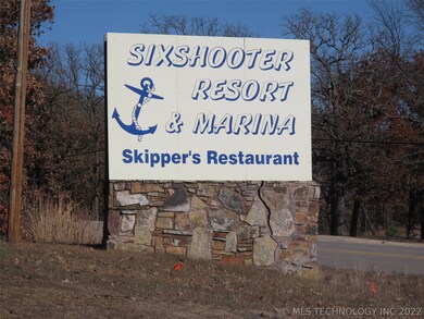 Lot is in Six Shooter Resort area.  This sign on H