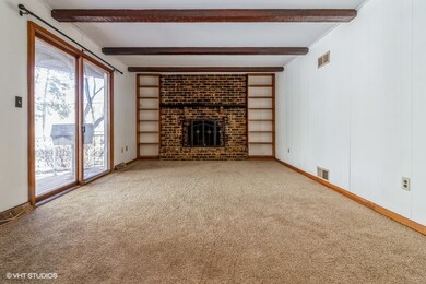 Large family room with wood burning fireplace and 