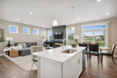 Notice the stunning natural light pouring into this spacious family room.  *Photos of model home; colors and finishes will vary.