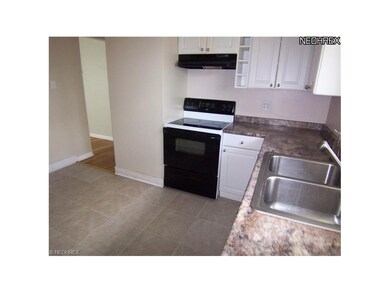 Updated kitchen with appliance.